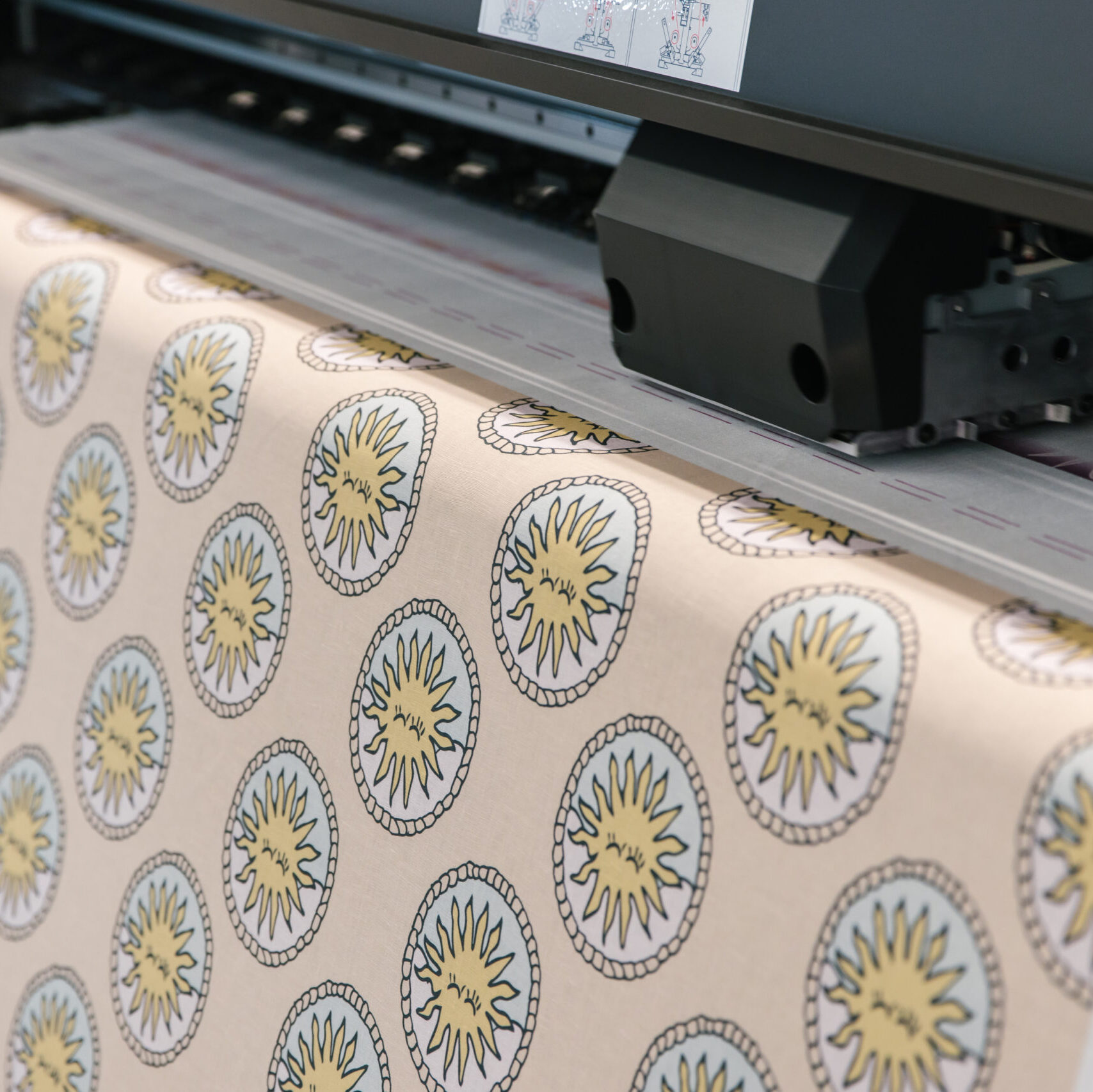 Digital fabric printing process showing fabric roll printing on industrial textile printer