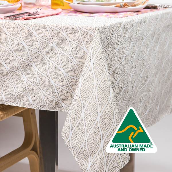 An image of a custom printed table cloth with the Australian-made and owned triangle logo
